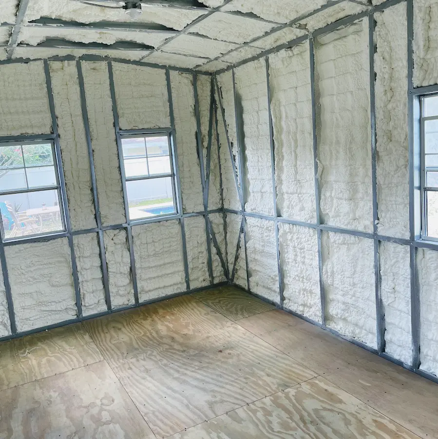 Closed-cell spray foam insulation applied to wall cavities in a residential project in Locust Grove
